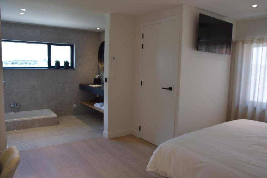 Postel nebo postele na pokoji v ubytování B&B Villa Mimosa
