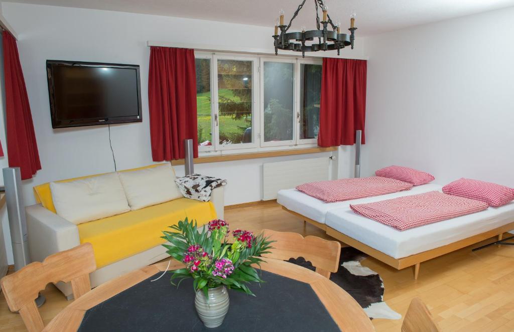 Postel nebo postele na pokoji v ubytování Erlebacherhus