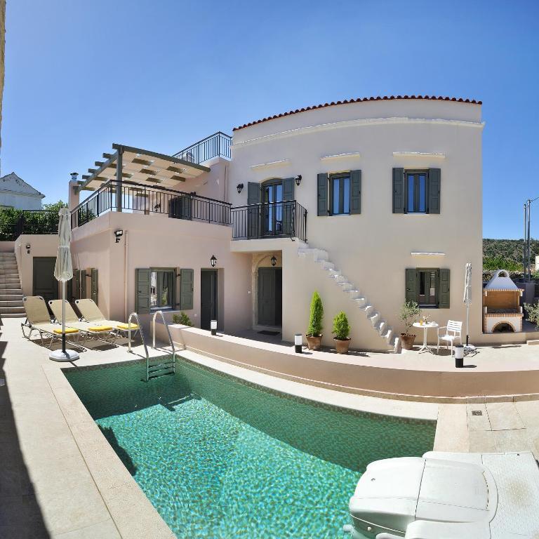 The swimming pool at or close to Villa Stylianna