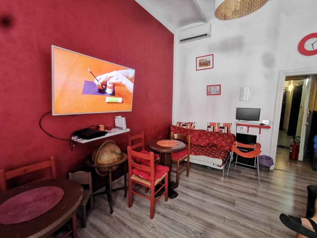 TV a/nebo společenská místnost v ubytování Român Holidays