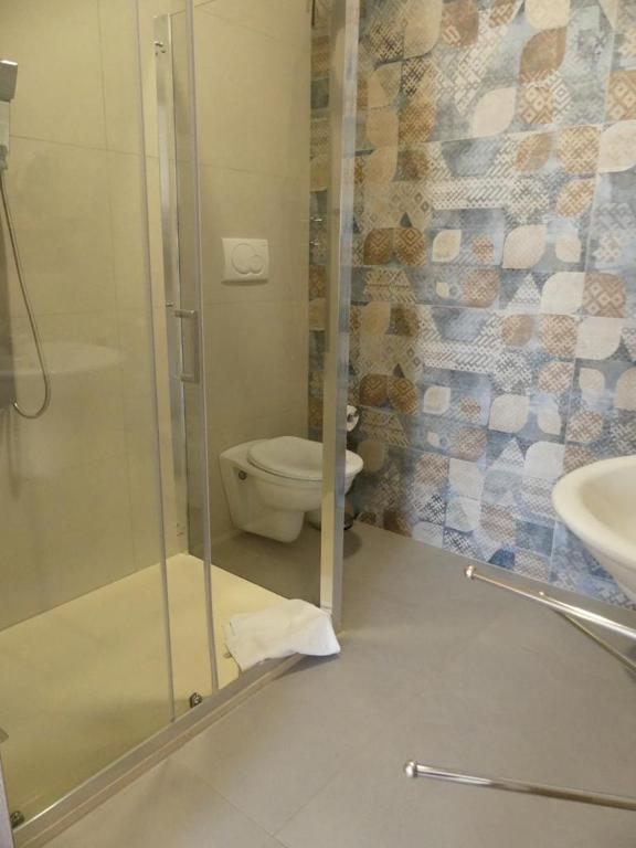 Koupelna v ubytování Albergo Piazza Risorgimento