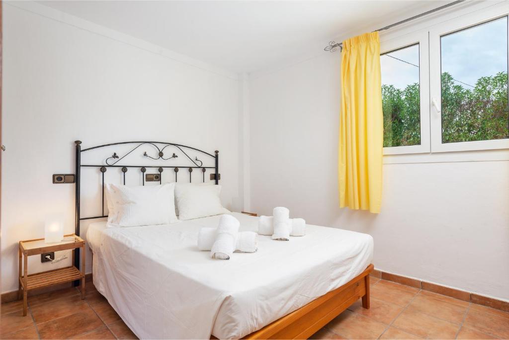 Posteľ alebo postele v izbe v ubytovaní Villa Cala Marsal