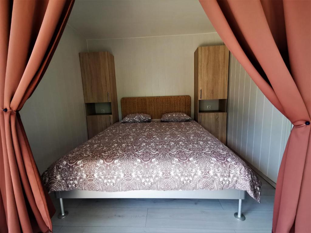 Postel nebo postele na pokoji v ubytování Vita Mia