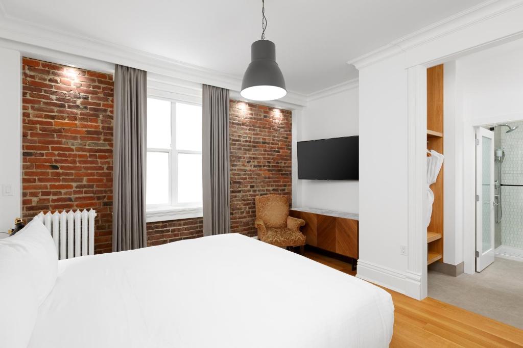 TV a/nebo společenská místnost v ubytování Victorian Hotel