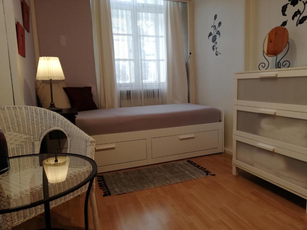 Postel nebo postele na pokoji v ubytování Apartment Karolina