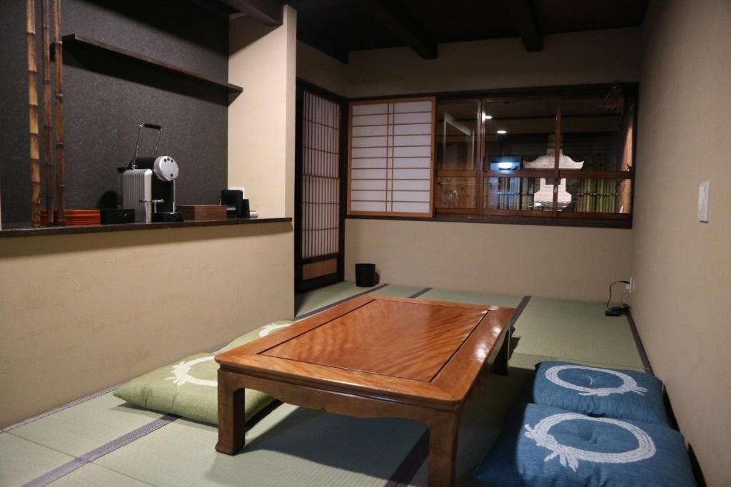 a living room with a table and a couch at Takayama - House - Vacation STAY 89815 in Takayama
