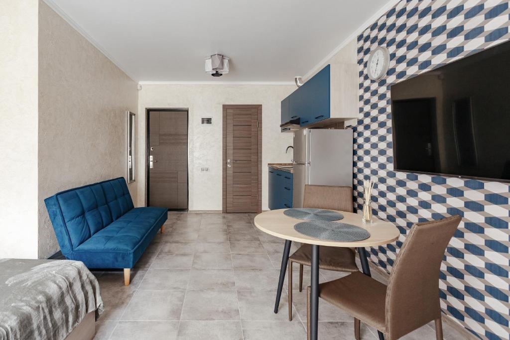 TV a/nebo společenská místnost v ubytování YUDGI - Home Hotel