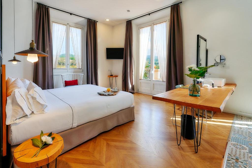Postel nebo postele na pokoji v ubytování Hotel Arrey Alella