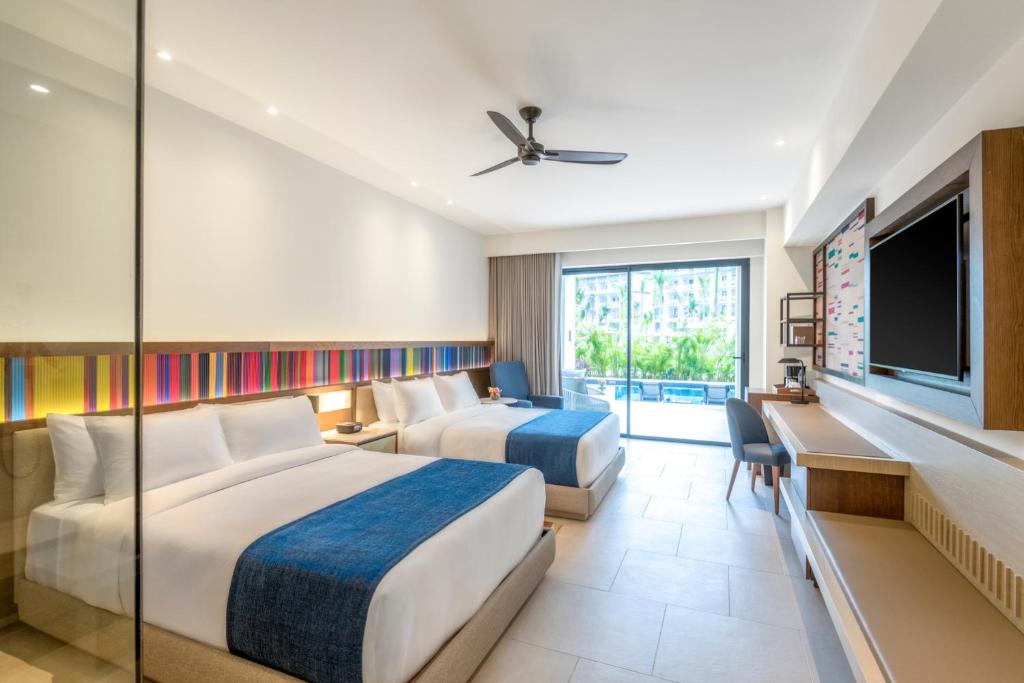 TV a/nebo společenská místnost v ubytování Hyatt Zilara Cap Cana - Adults Only