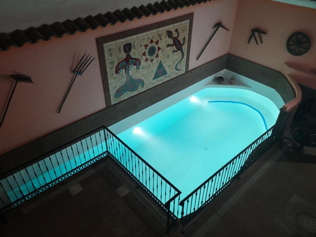 a hot tub in a room with at La Casona Canaria Boutique Home B & B in Agüimes