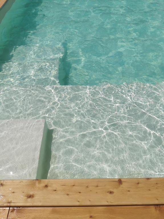 Bazén v ubytování Lapilanoa - Suite & Pool nebo v jeho okolí