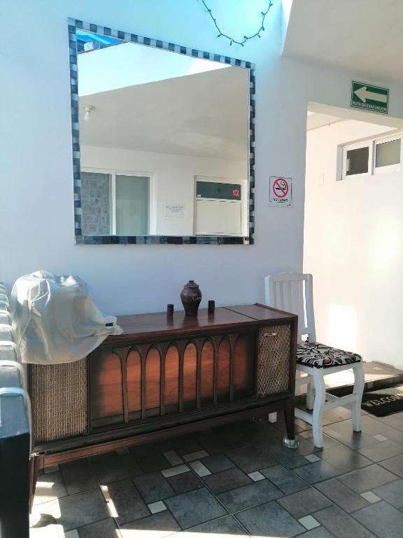 Posezení v ubytování Hostal Maple