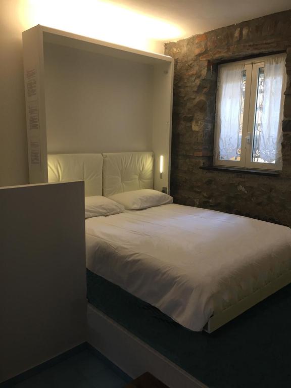 Posteľ alebo postele v izbe v ubytovaní Monterosso al Mare 20