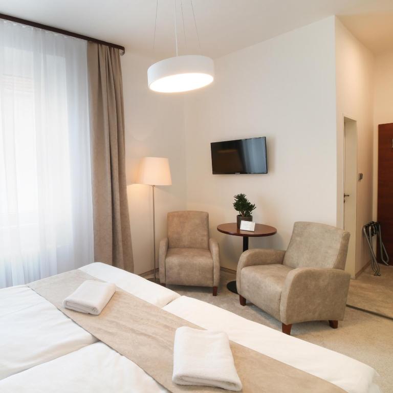 TV a/nebo společenská místnost v ubytování Hotel KOZÁK