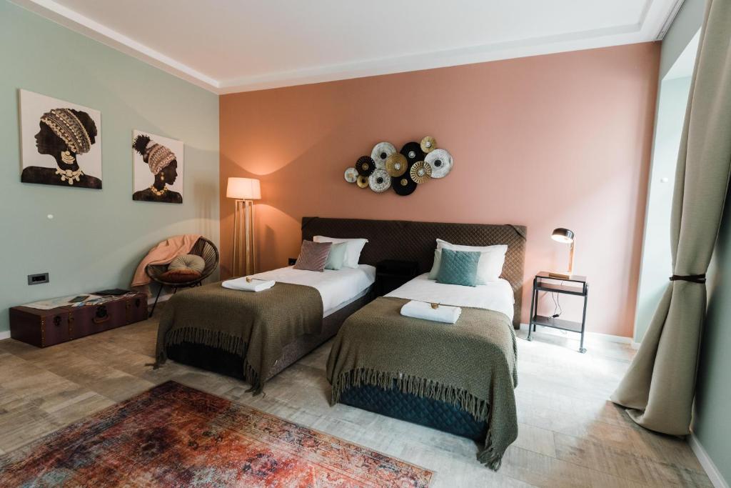 Postel nebo postele na pokoji v ubytování Square 19-Boutique rooms