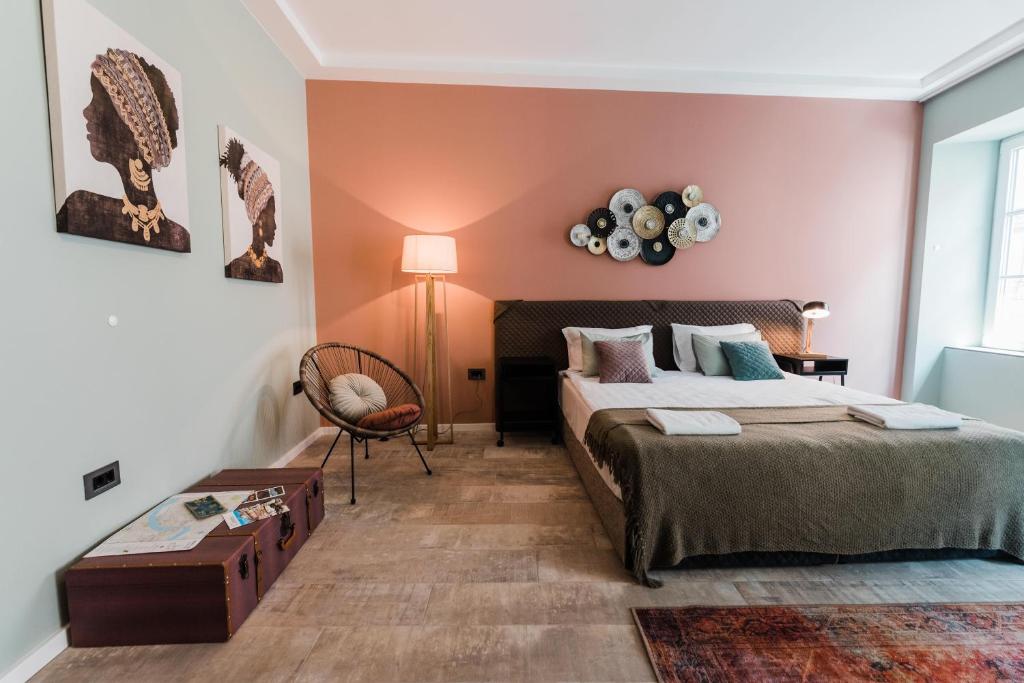 Postel nebo postele na pokoji v ubytování Square 19-Boutique rooms