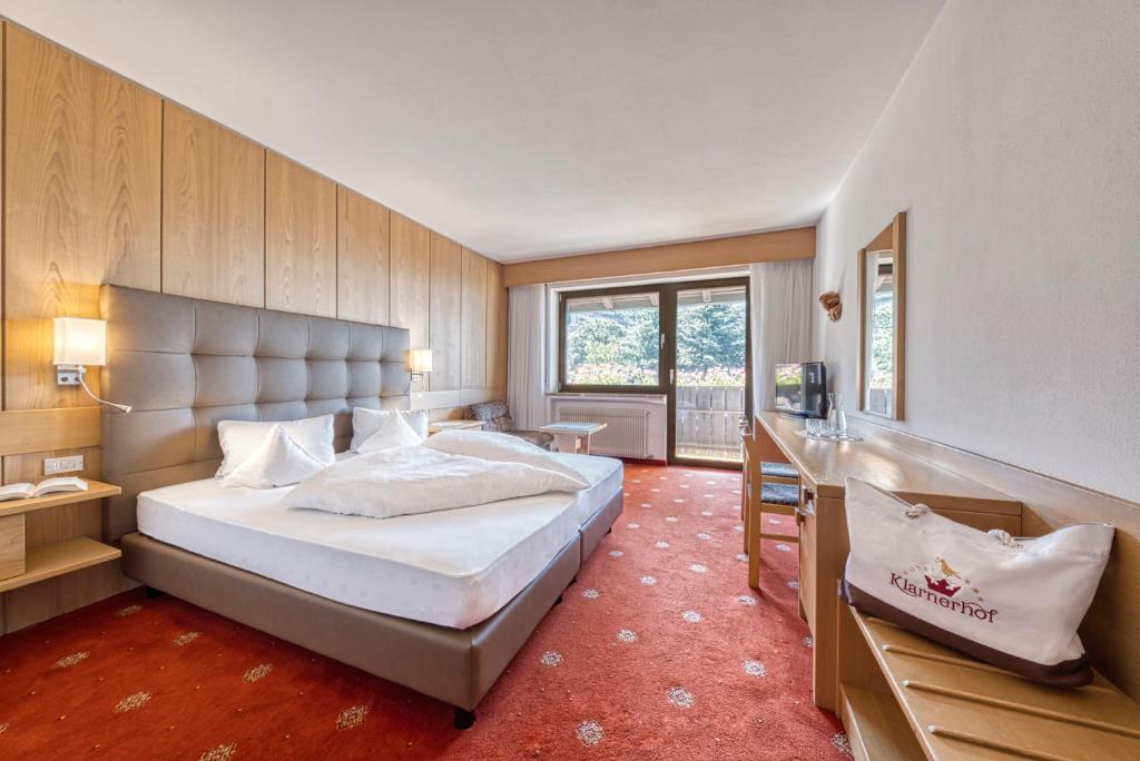 Postel nebo postele na pokoji v ubytování Hotel Klarnerhof