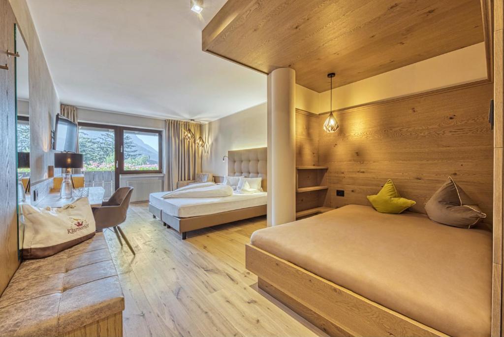 Postel nebo postele na pokoji v ubytování Hotel Klarnerhof