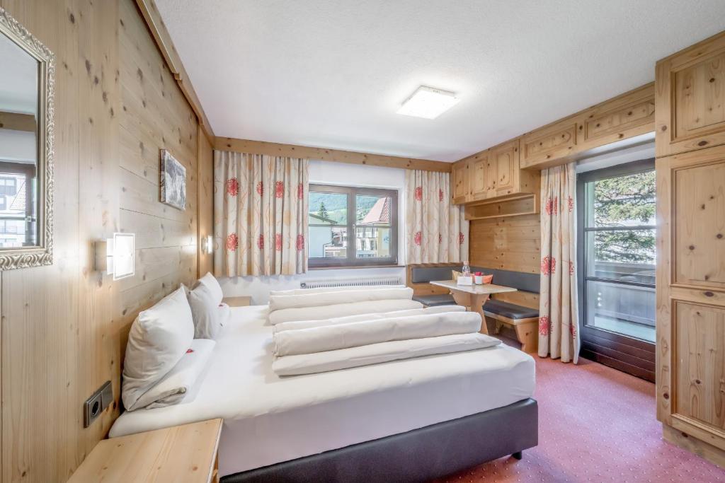 Posteľ alebo postele v izbe v ubytovaní Corso`s Annabell - Bed & Breakfast