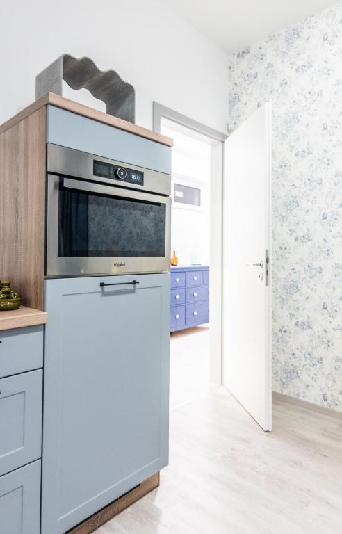Kuchyň nebo kuchyňský kout v ubytování Vinorell Apartman