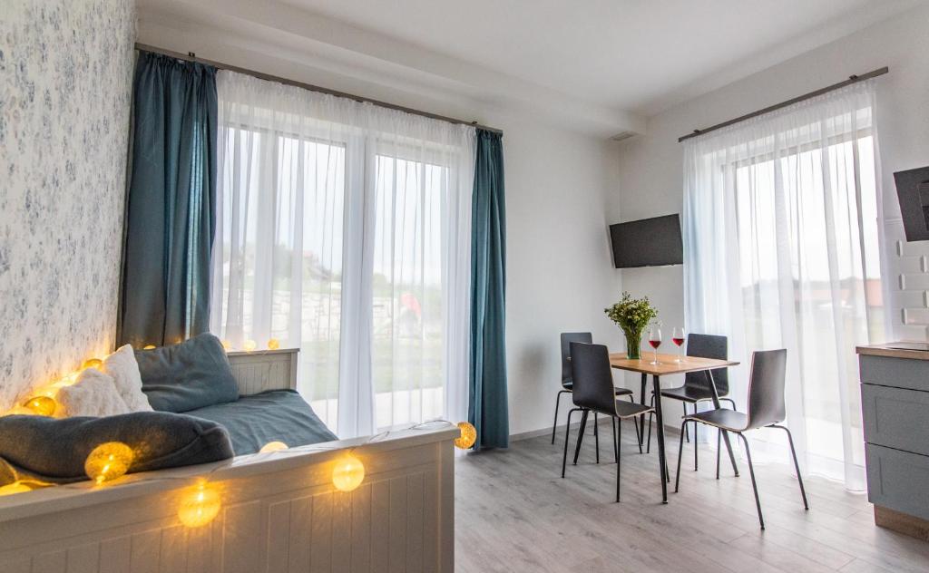TV a/nebo společenská místnost v ubytování Vinorell Apartman