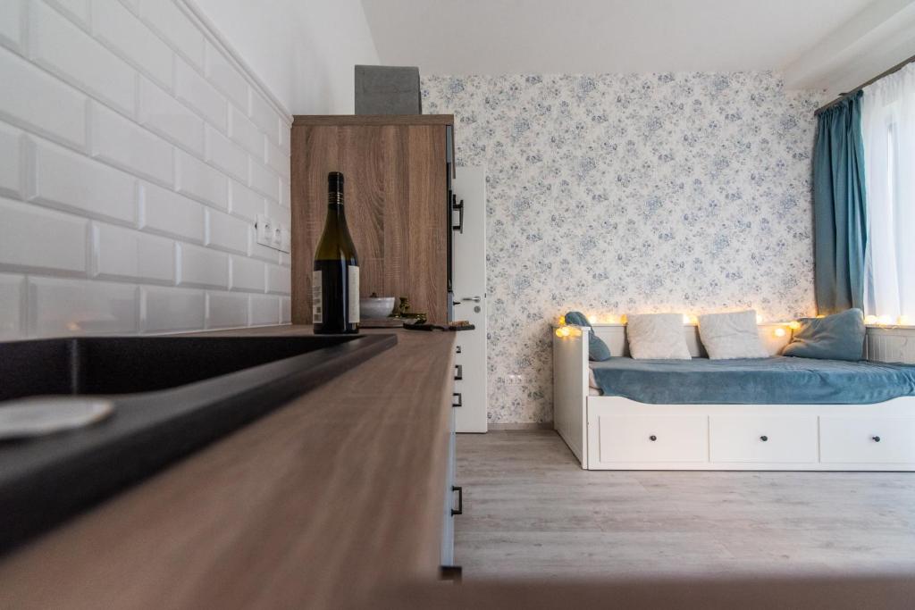 Postel nebo postele na pokoji v ubytování Vinorell Apartman