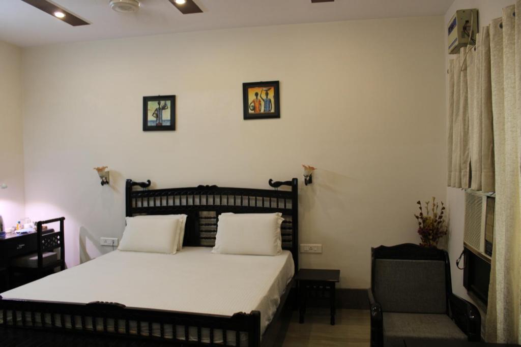 Postel nebo postele na pokoji v ubytování Pearl of Taj Home Stay