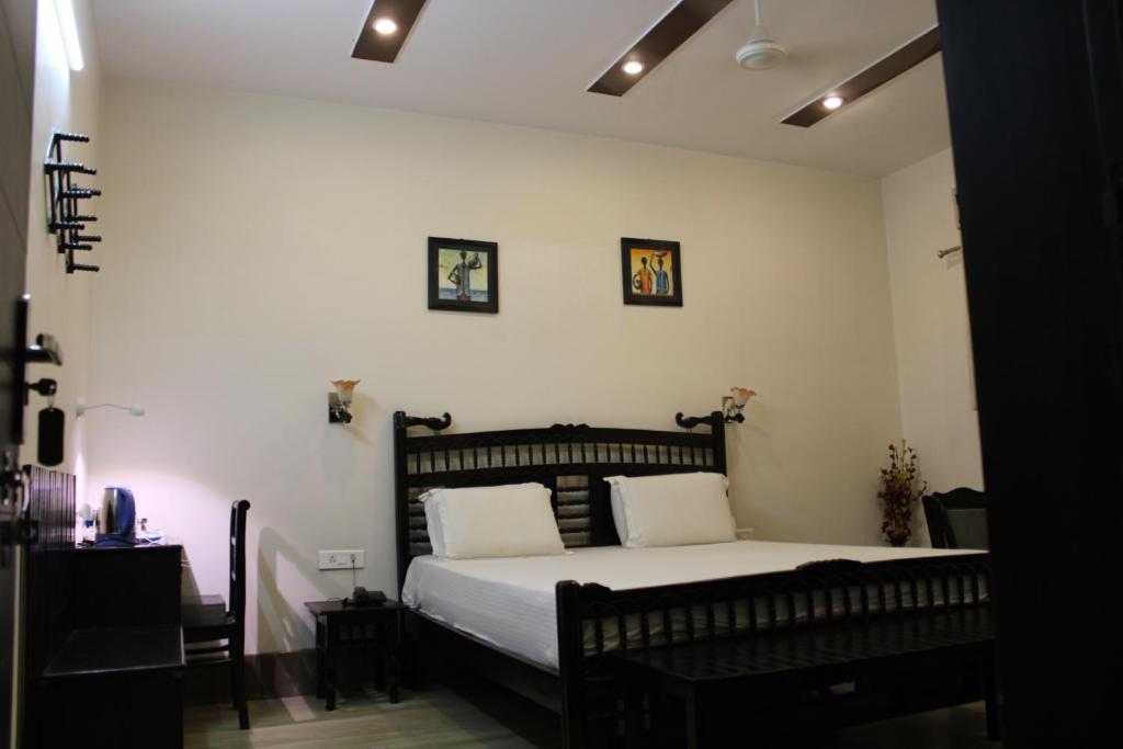 Postel nebo postele na pokoji v ubytování Pearl of Taj Home Stay