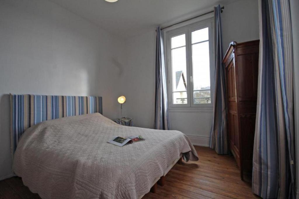 Postel nebo postele na pokoji v ubytování Normandie 12 couchages