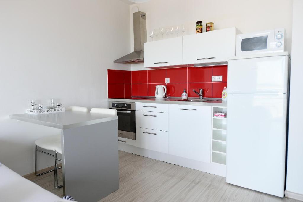 Kuchyň nebo kuchyňský kout v ubytování Apartmán Centroom
