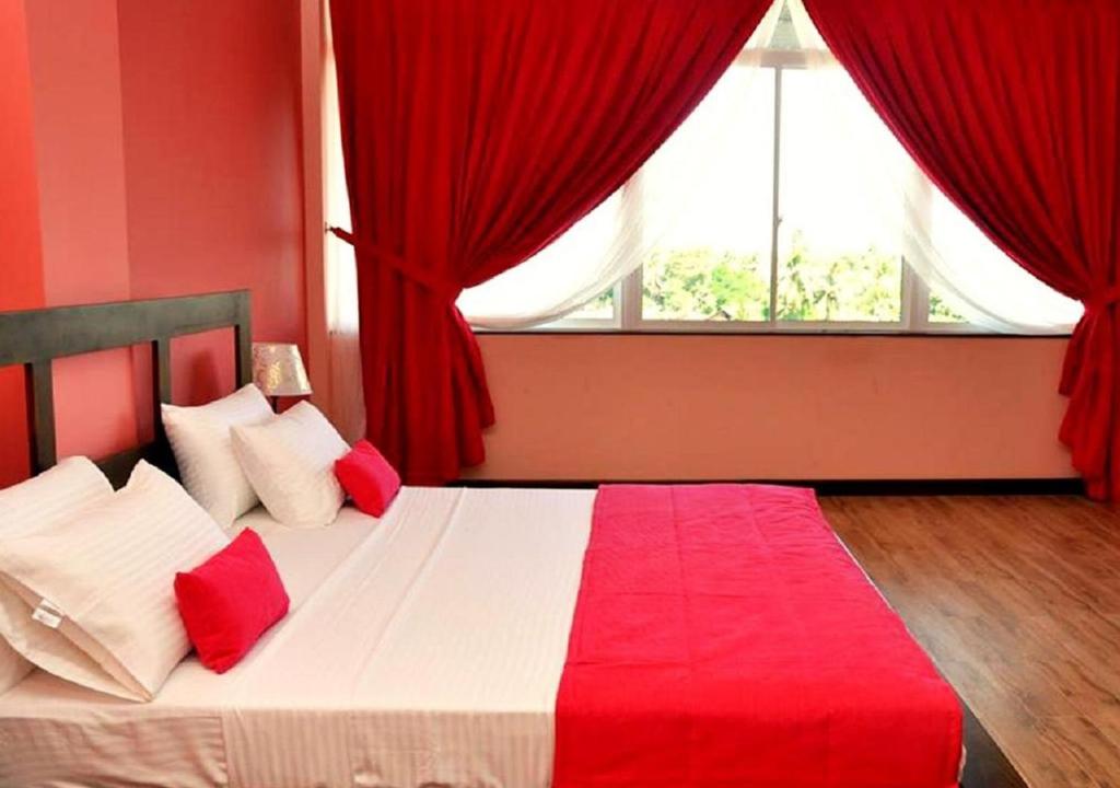 Postel nebo postele na pokoji v ubytování Hotel East Lagoon