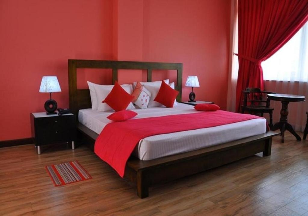 Postel nebo postele na pokoji v ubytování Hotel East Lagoon