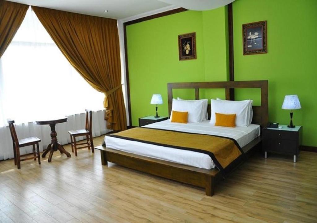 Postel nebo postele na pokoji v ubytování Hotel East Lagoon