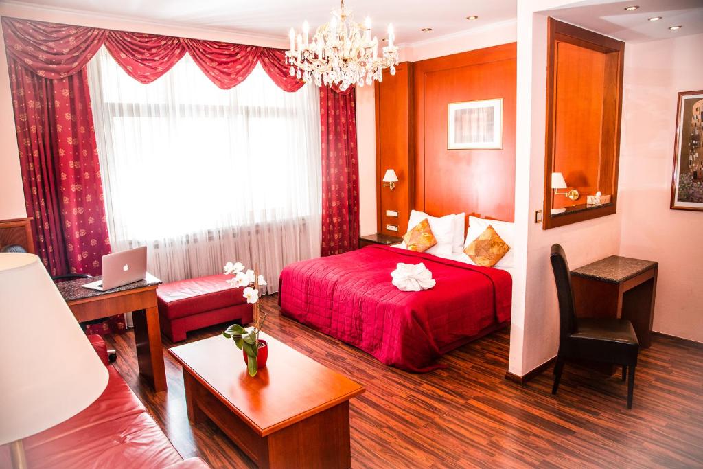 Postel nebo postele na pokoji v ubytování Hotel Corvinus Vienna - Newly Renovated
