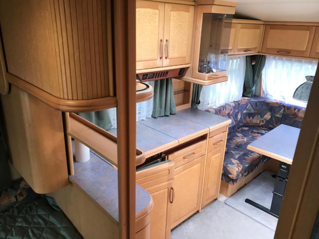 Kuchyň nebo kuchyňský kout v ubytování Gl. Klitgaard Camping & Cottages