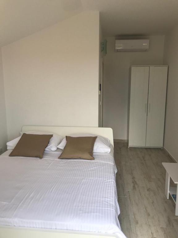 Postel nebo postele na pokoji v ubytování Guesthouse Davorka Bijelić