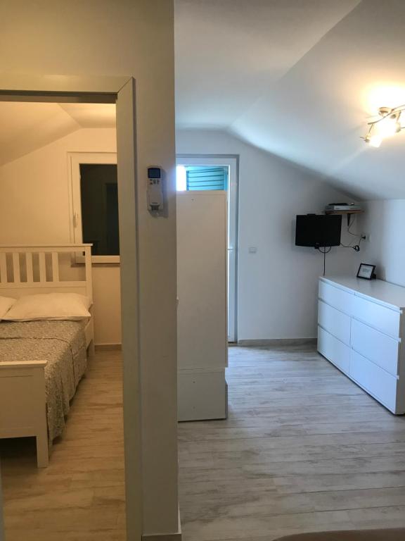 Postel nebo postele na pokoji v ubytování Guesthouse Davorka Bijelić
