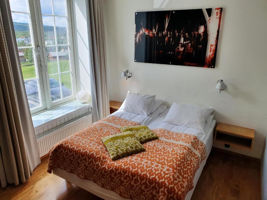 Postel nebo postele na pokoji v ubytování Vertshuset Røros