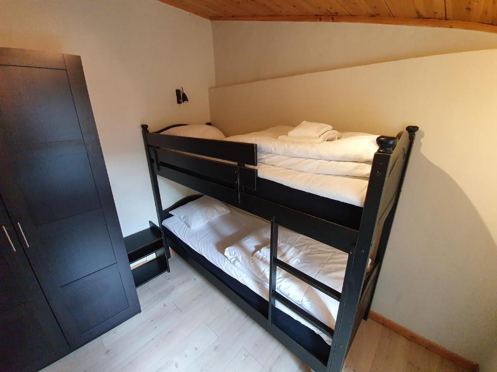 Postel nebo postele na pokoji v ubytování Vertshuset Røros