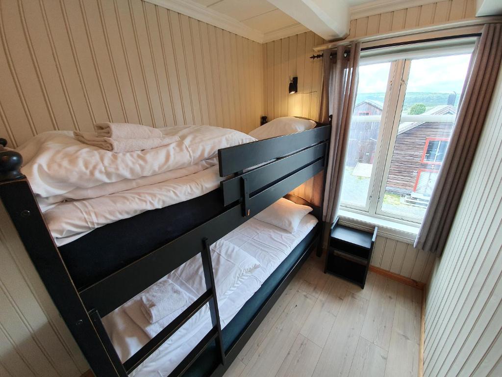 Postel nebo postele na pokoji v ubytování Vertshuset Røros