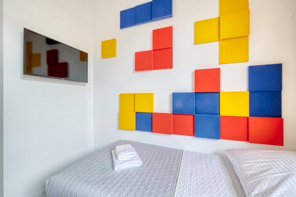 Postel nebo postele na pokoji v ubytování Level Rooms