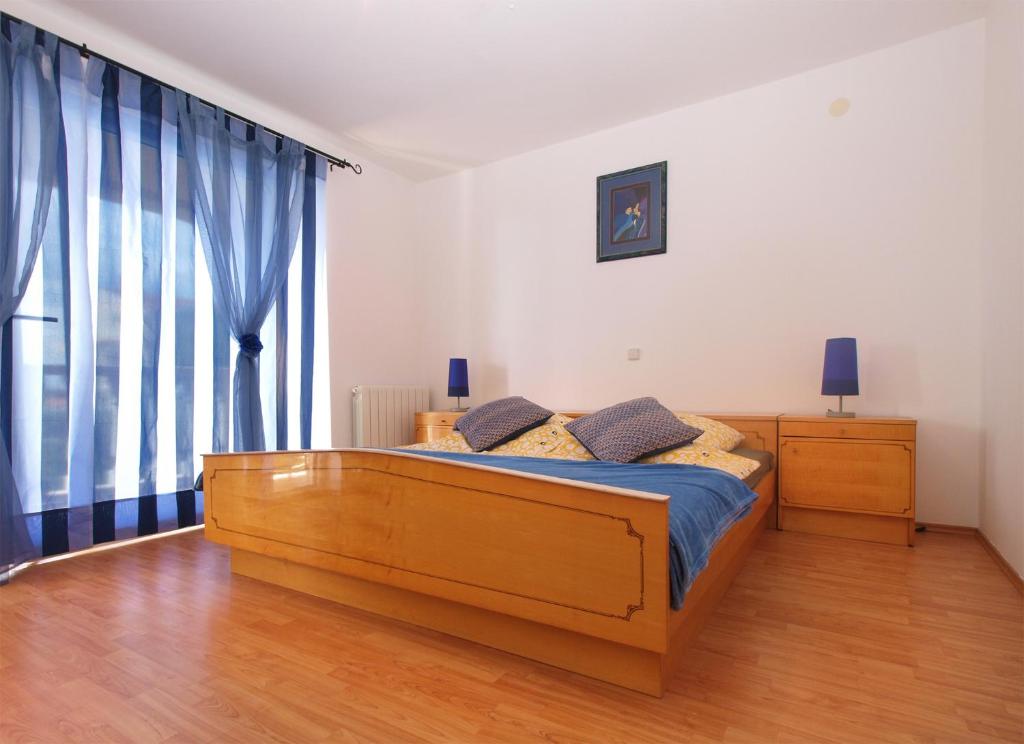 Posteľ alebo postele v izbe v ubytovaní Apartments Katarina 2054