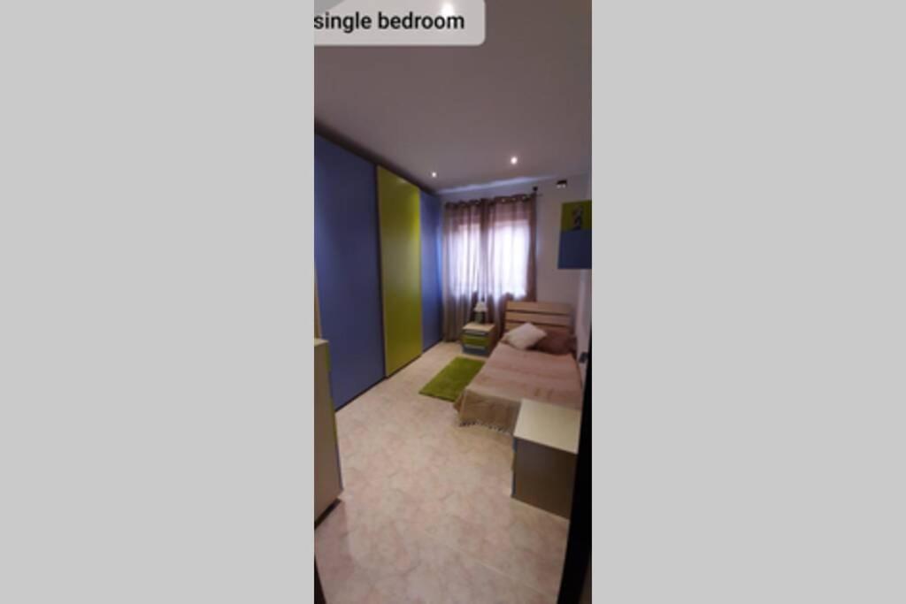 Postel nebo postele na pokoji v ubytování Joecen Apartment