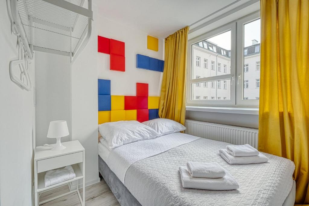 Postel nebo postele na pokoji v ubytování Level Rooms
