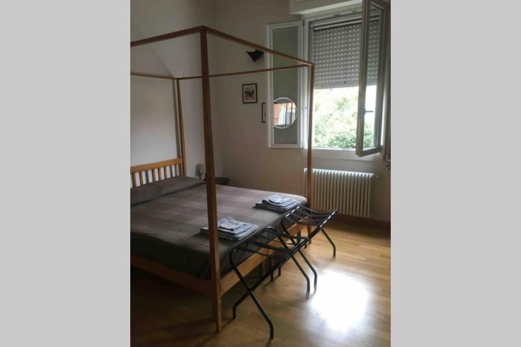 A bed or beds in a room at House Bologna Stazione Mazzini flat x 2