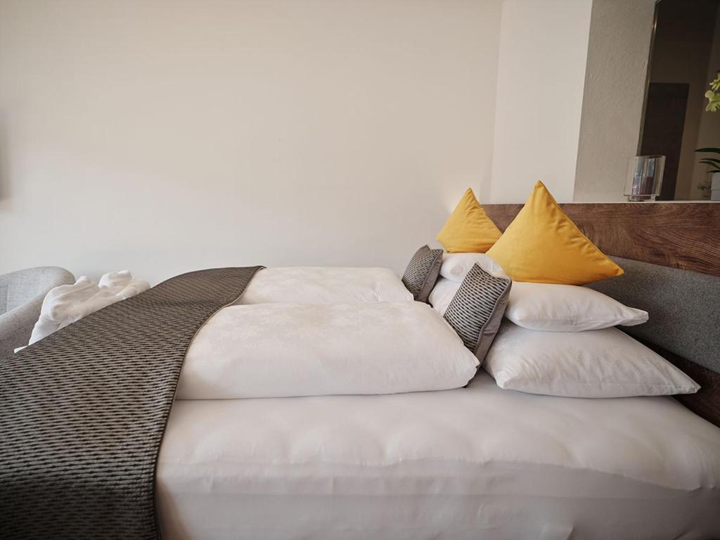 Posteľ alebo postele v izbe v ubytovaní SEE Moment Appartements ADULTS ONLY