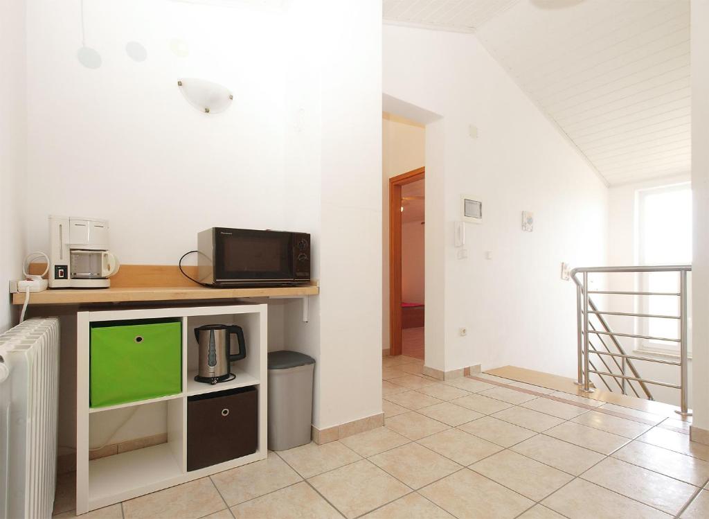 Kuchyňa alebo kuchynka v ubytovaní Apartments Katarina 2054