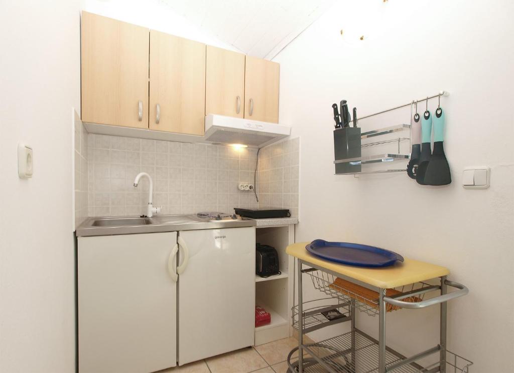 Kuchyňa alebo kuchynka v ubytovaní Apartments Katarina 2054