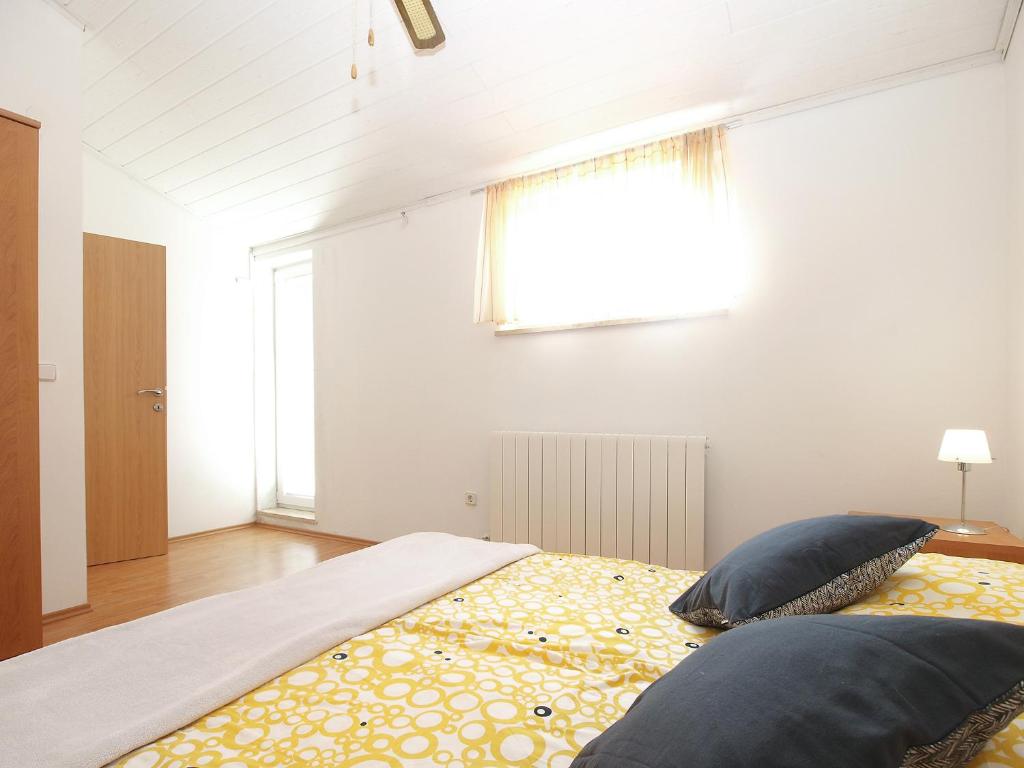 Posteľ alebo postele v izbe v ubytovaní Apartments Katarina 2054