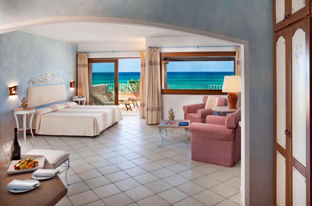 Postel nebo postele na pokoji v ubytování Resort & SPA Le Dune